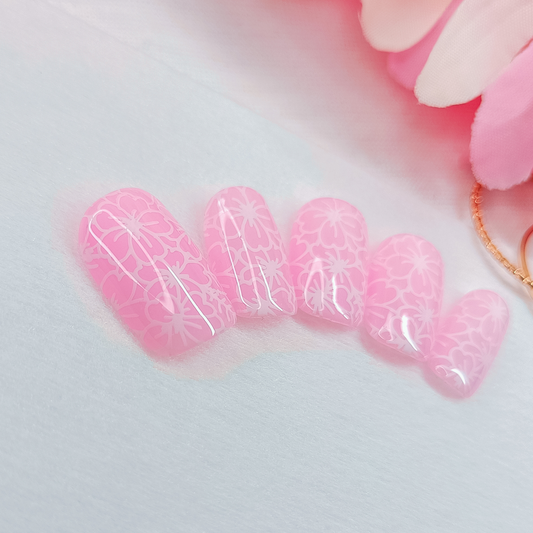 AMELIE – Unghie finte press on rosa con fiori bianchi