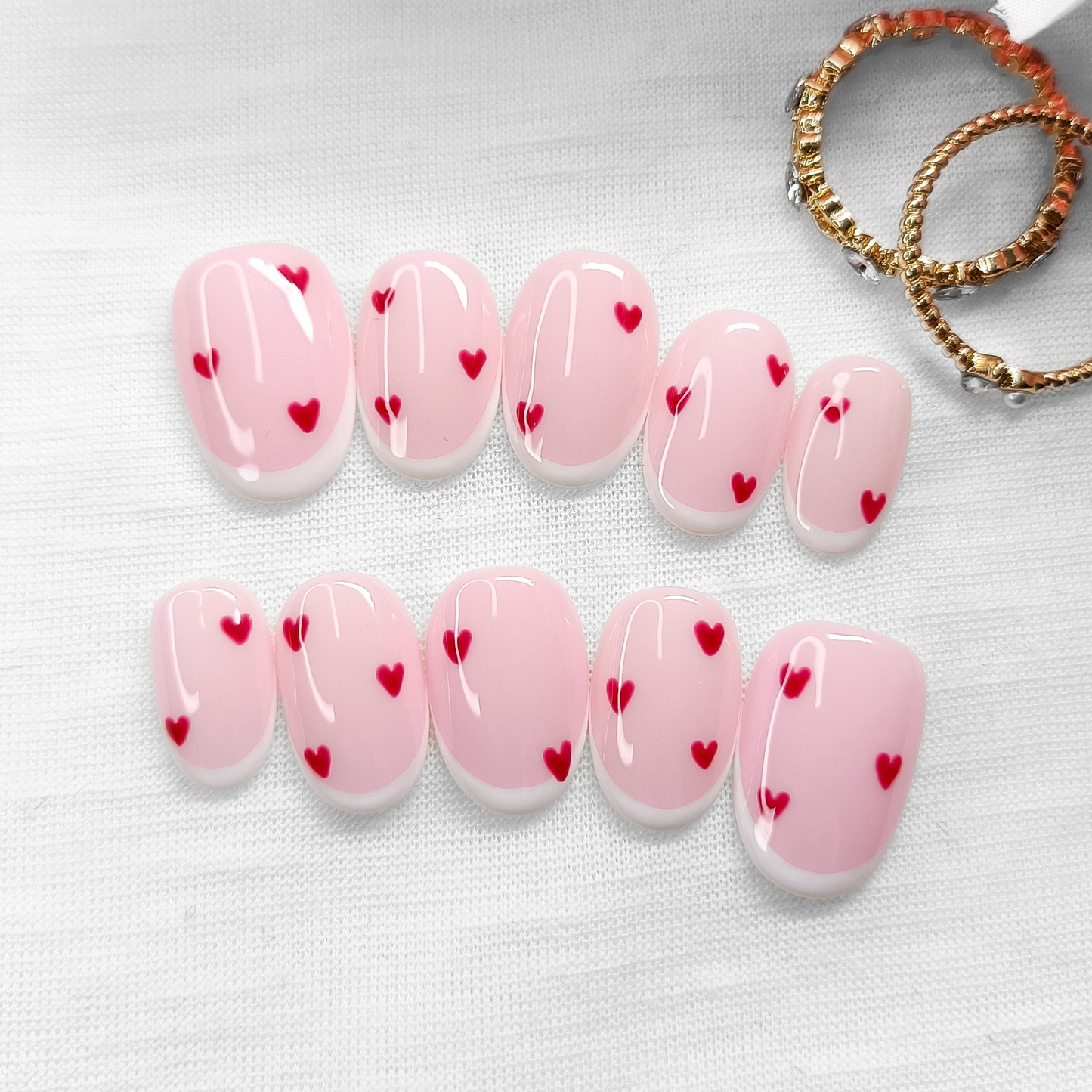 SWEETHEART - unghie finte press on rosa chiaro con cuori rossi e french