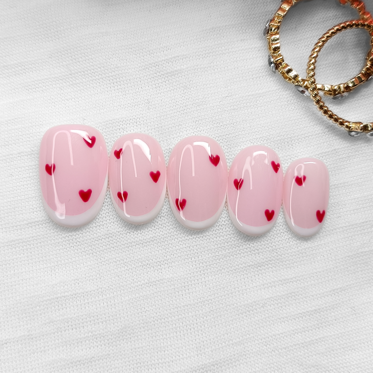 SWEETHEART - unghie finte press on rosa chiaro con cuori rossi e french